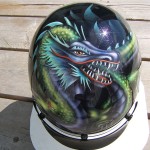 “Joss” for Bruce. The dragon was designed by Bruce’s 12 year old grandson, Joss... and I painted it on his helmet. 3 of 3