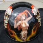 "Pin up girl in flames" painted on a helmet that already had stickered skulls ...... I just added the girl and some flame. 1 of 1